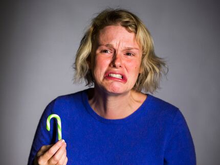Guide editor Ann Pinson looks punished after tasting the wasabi candy cane.