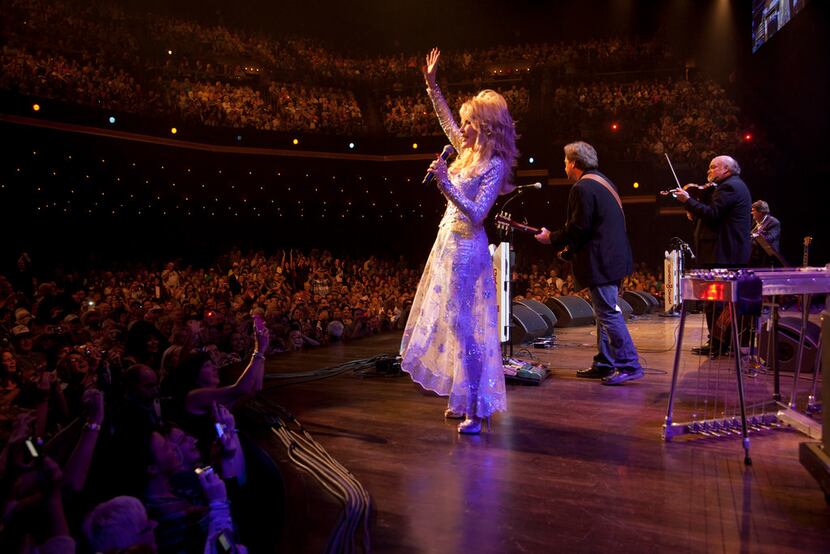Dolly Parton performs at the Grand Ole Opry, a country music mecca in Nashville. 