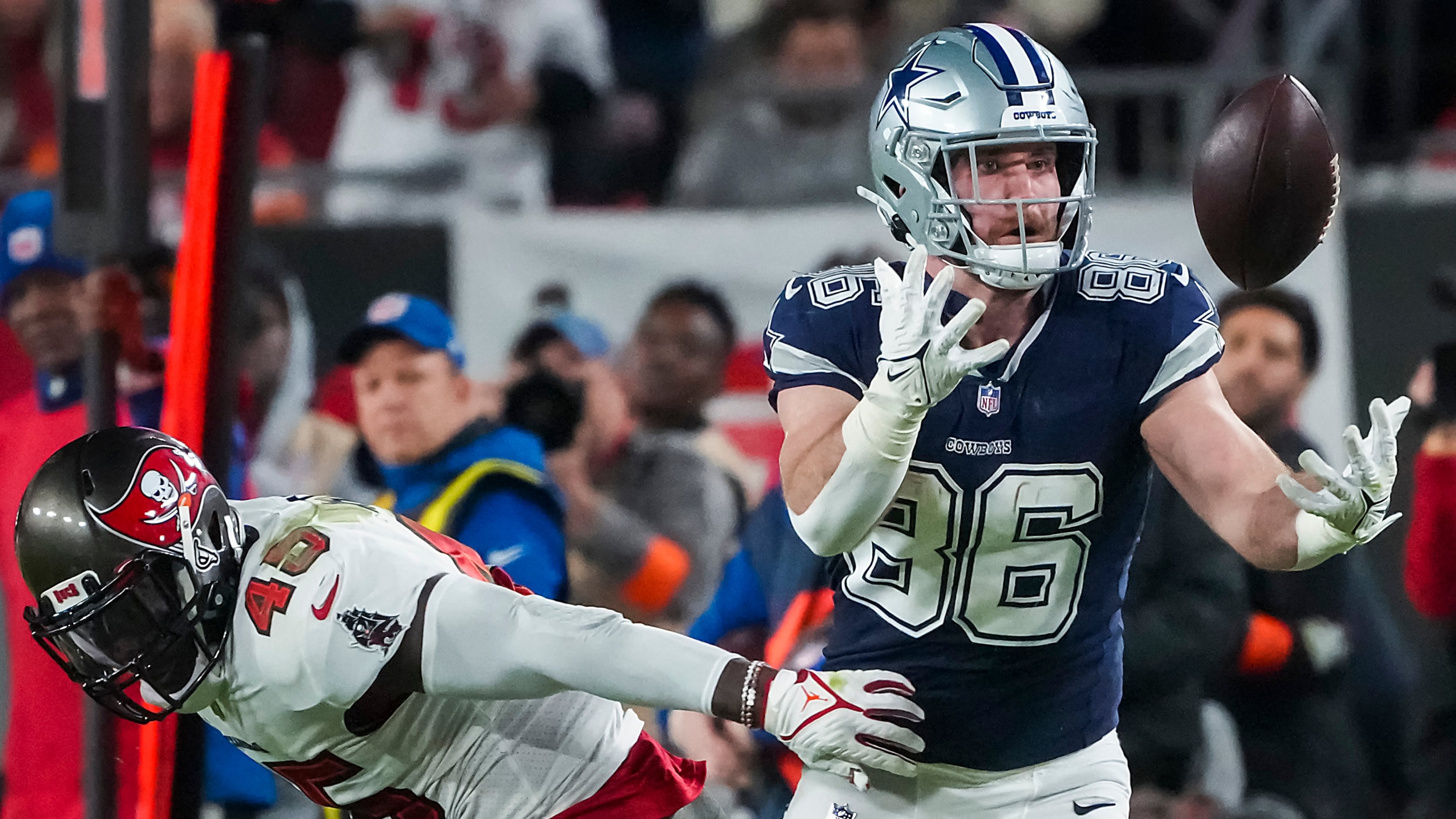 Dalton Schultz Dallas Cowboys Unsigned Makes Touchdown Catch Photograph