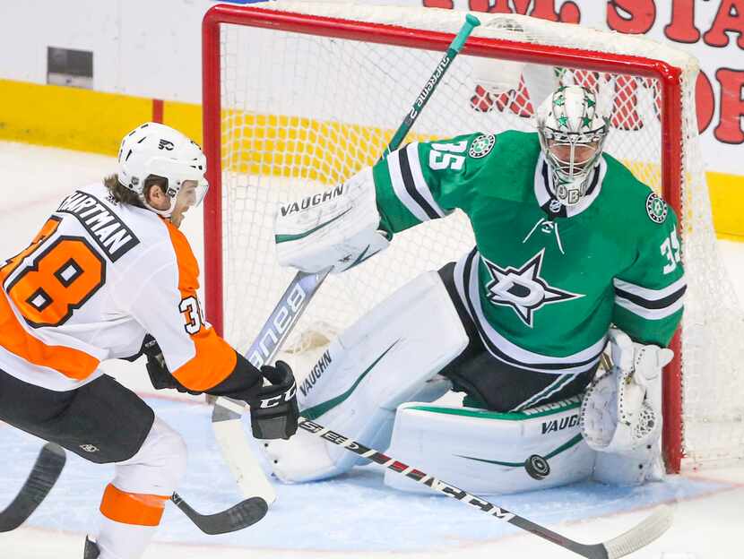 Dallas Stars goaltender Anton Khudobin (35) makes a save against Philadelphia Flyers forward...