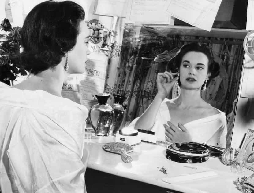  In this file photo taken on August 23, 1954 shows US actress and fashion designer Gloria...