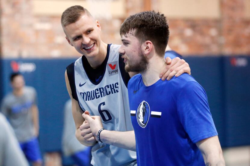 Dallas Mavericks forward Kristaps Porzingis (6) and Dallas Mavericks forward Luka Doncic...