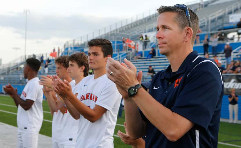 Wakeland boys soccer head coach Andy Holt claps for Wichita Falls after his team won 6-0...