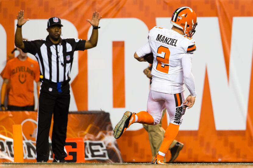 CLEVELAND, OH - AUGUST 13: Quarterback Johnny Manziel #2 of the Cleveland Browns runs in a...