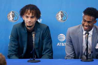 Newly drafted Dallas Mavericks players Dereck Lively II of Duke (left) and Olivier-Maxence...