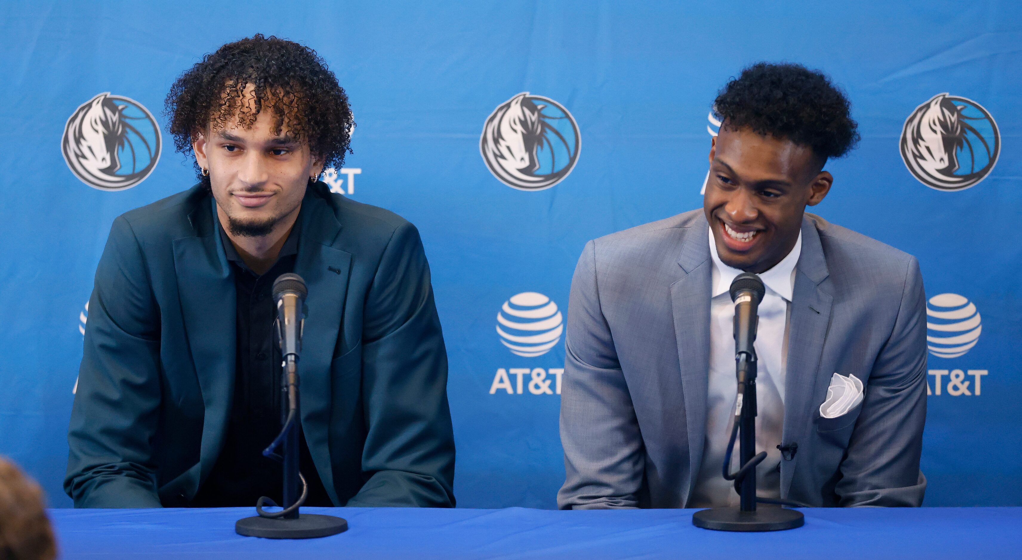 Newly drafted Dallas Mavericks players Dereck Lively II of Duke (left) and Olivier-Maxence...