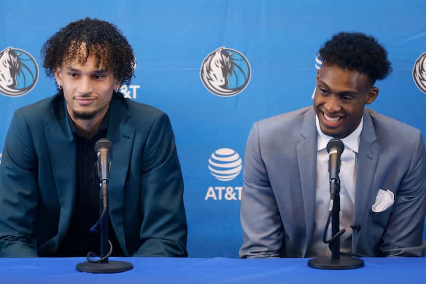 Newly drafted Dallas Mavericks players Dereck Lively II of Duke (left) and Olivier-Maxence...