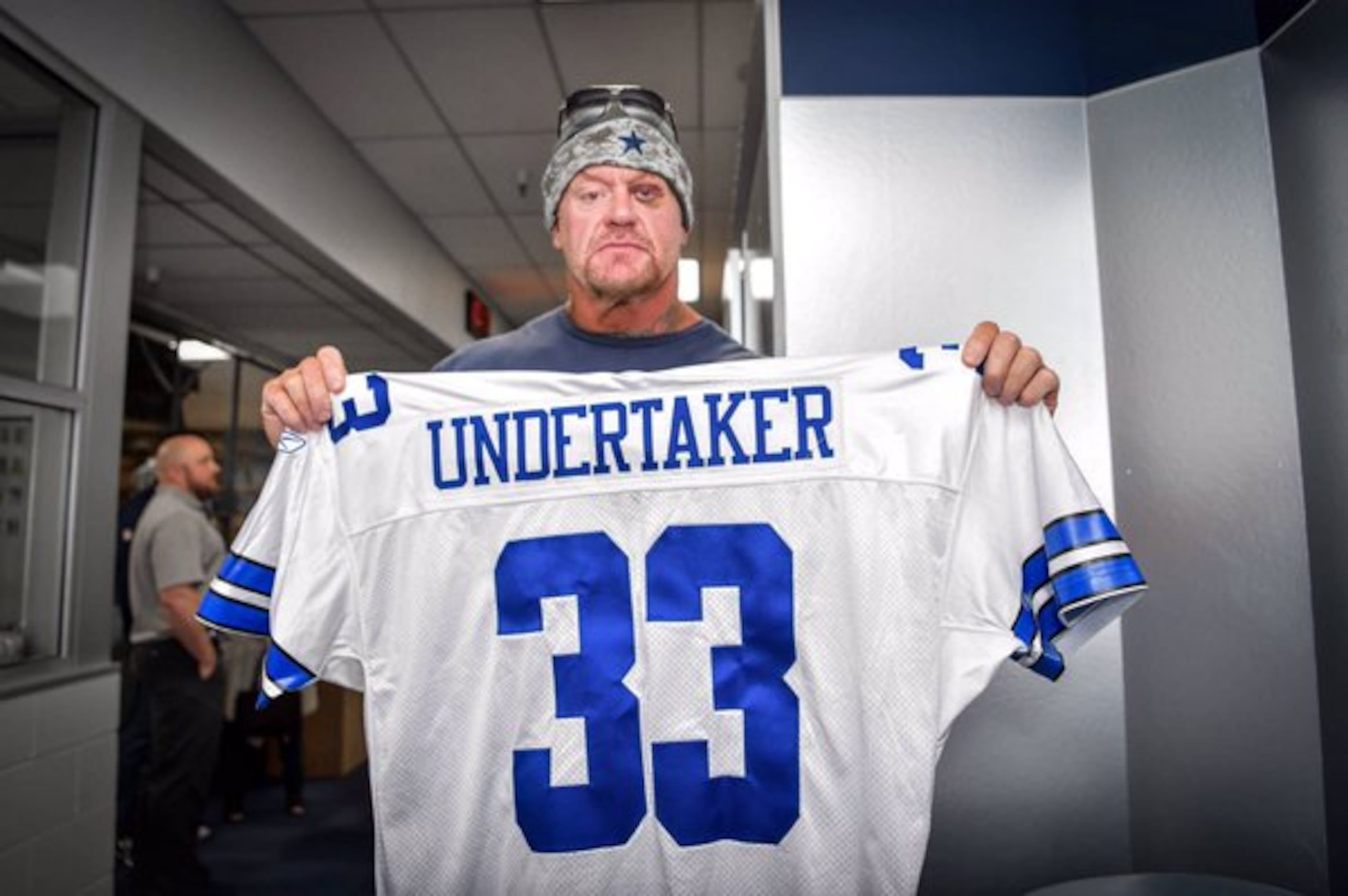 WWE's Undertaker talks Cowboys, Longhorns fandom; what it meant to be part  of Salute to Service game