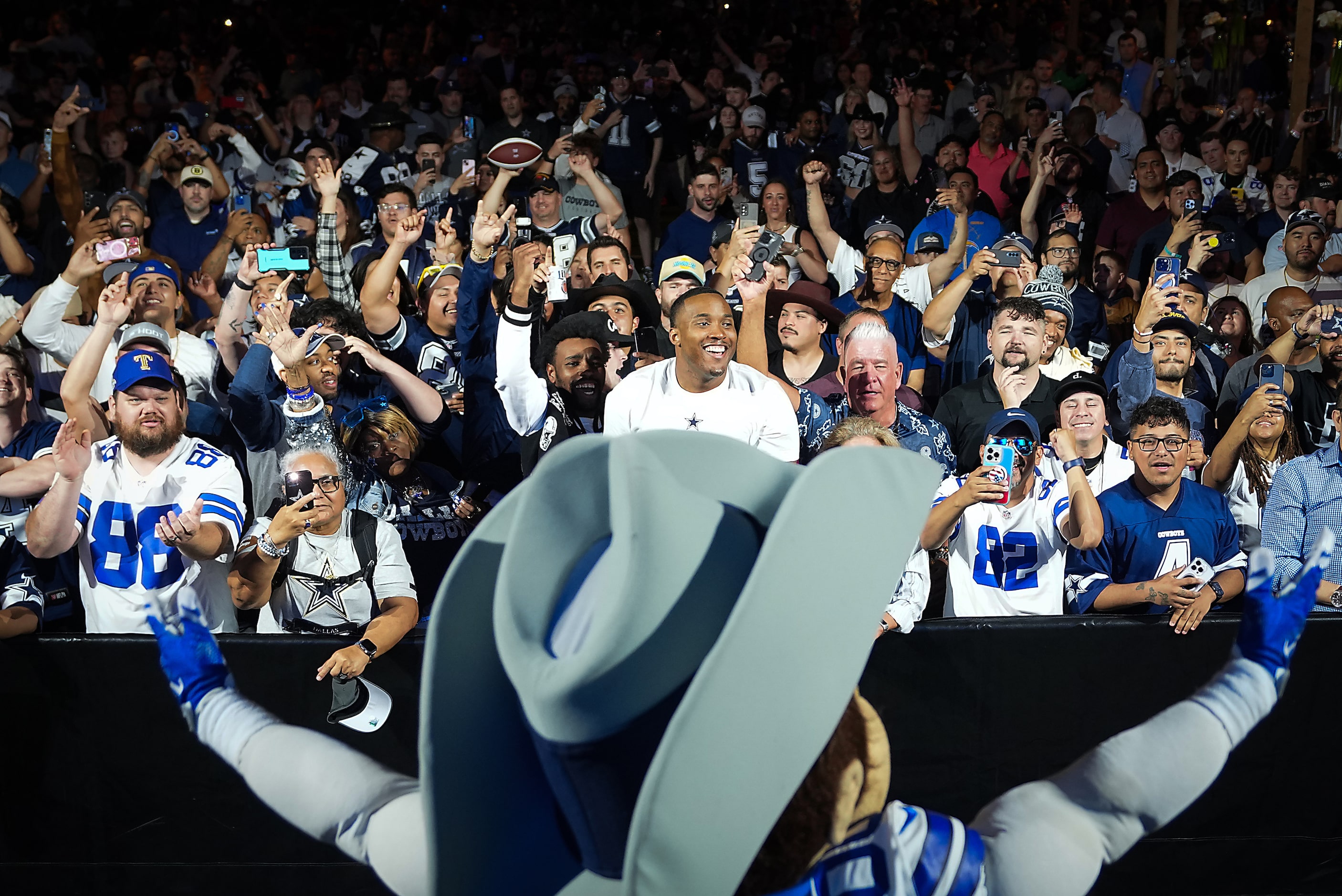 Dallas Cowboys mascot Rowdy fires up the crowd as fans await the team’s first round pick in...