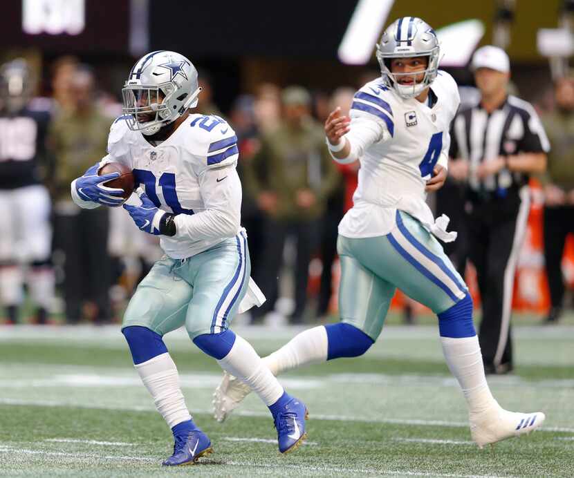 Dallas Cowboys running back Ezekiel Elliott (21) runs up the field after Dallas Cowboys...