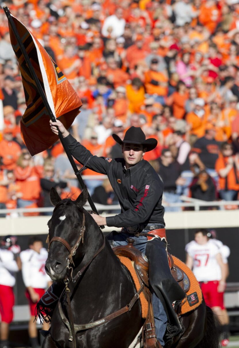 Nov 17, 2012; Stillwater OK, USA; Oklahoma State Cowboys mascot Bullet and spirit rider...