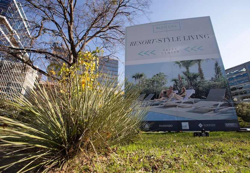 A sign for Harwood International planted along Harry Hines Boulevard, across the street from...