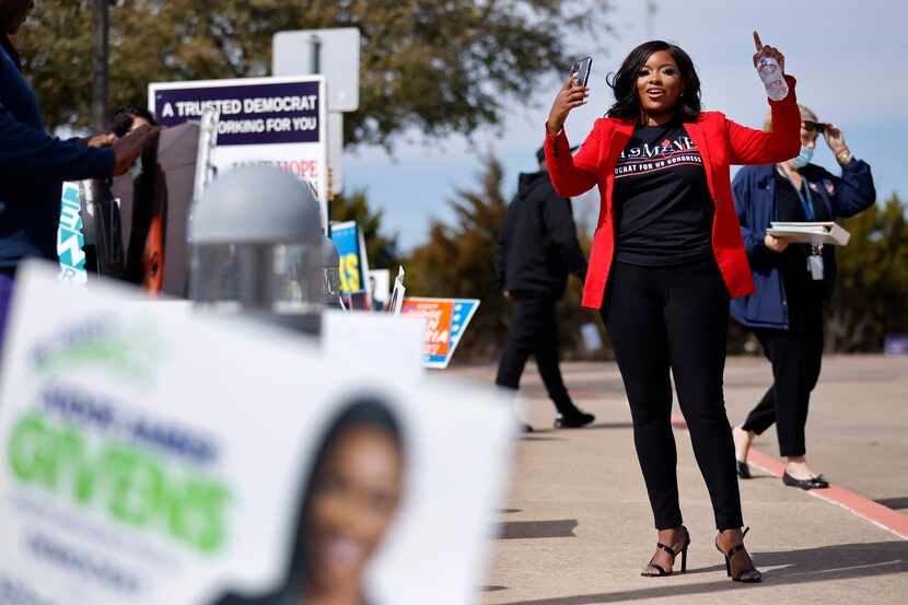 U.S. House Texas District 30 candidate Jasmine Crockett records a video of herself as she...