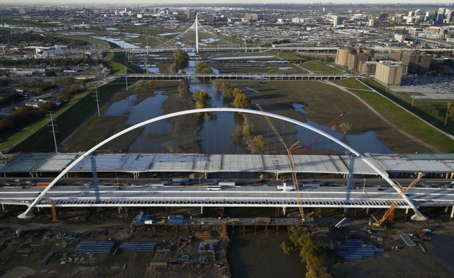 An aerial view looking north of the Margaret McDermott Bridge (foreground) and the Calatrava...