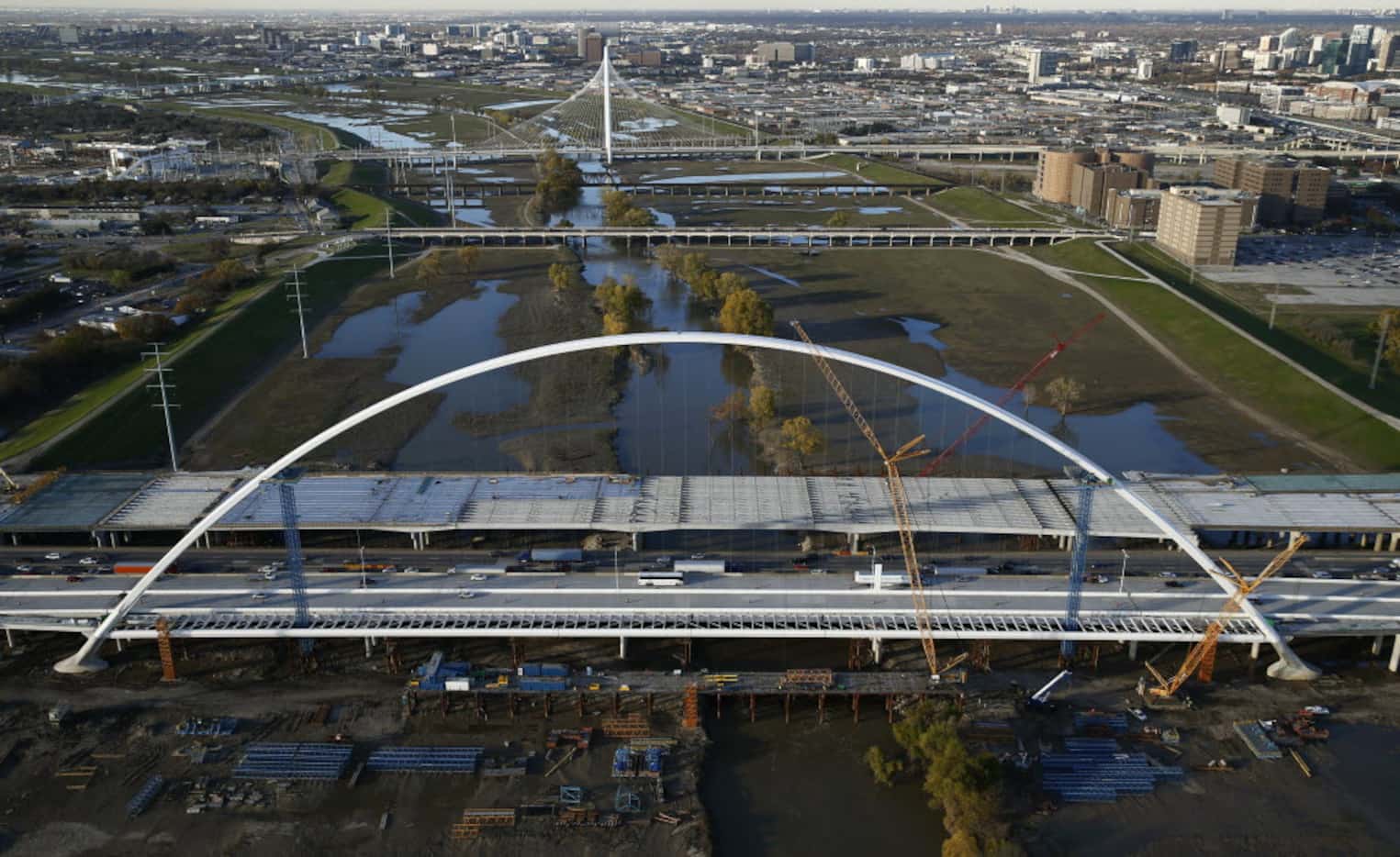 An aerial view looking north of the Margaret McDermott Bridge (foreground) and the Calatrava...