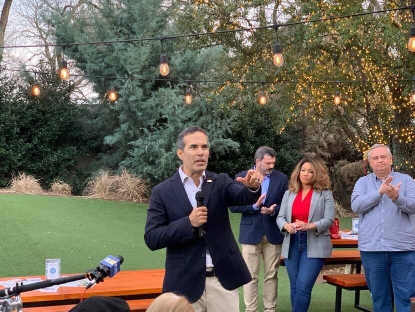 George P. Bush, Texas land commissioner and attorney general candidate, talks to supporters...