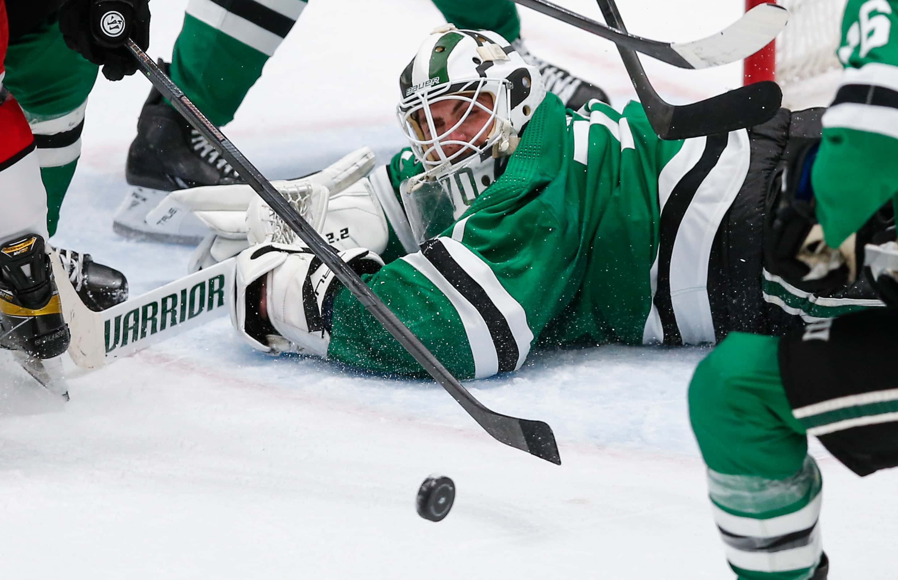Dallas Stars goaltender Braden Holtby (70) stops a shot by the Carolina Hurricanes during...