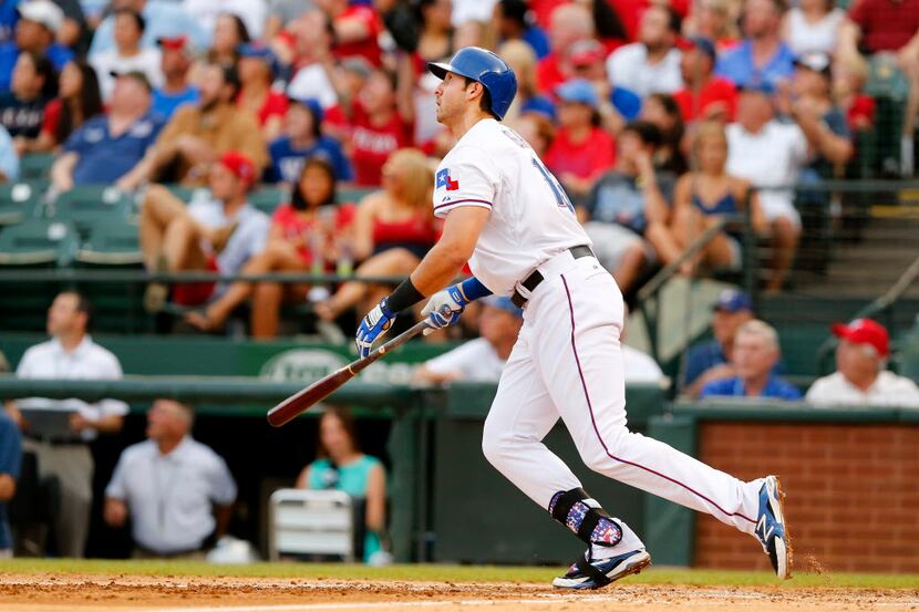 Texas Rangers third baseman Joey Gallo (13) watches his two-run homer during his second...