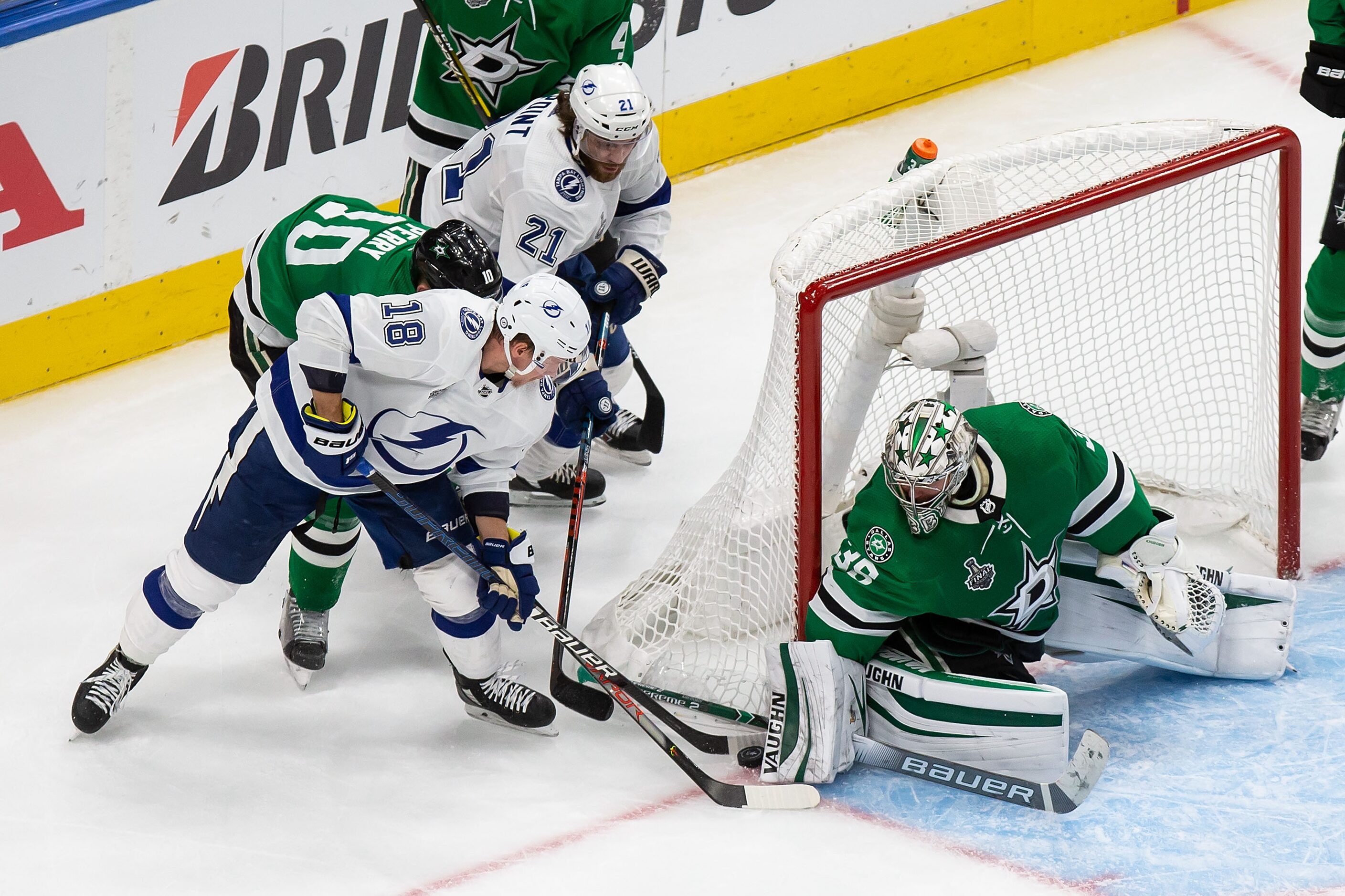 Goaltender Anton Khudobin (35) of the Dallas Stars makes a save against Ondrej Palat (18) of...