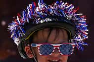 A youngster is decked out for the holiday while participating in the annual Canyon Creek 4th...