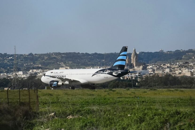 An Afriqiyah Airways plane from Libya stands on the tarmac at Malta's Luqa International...