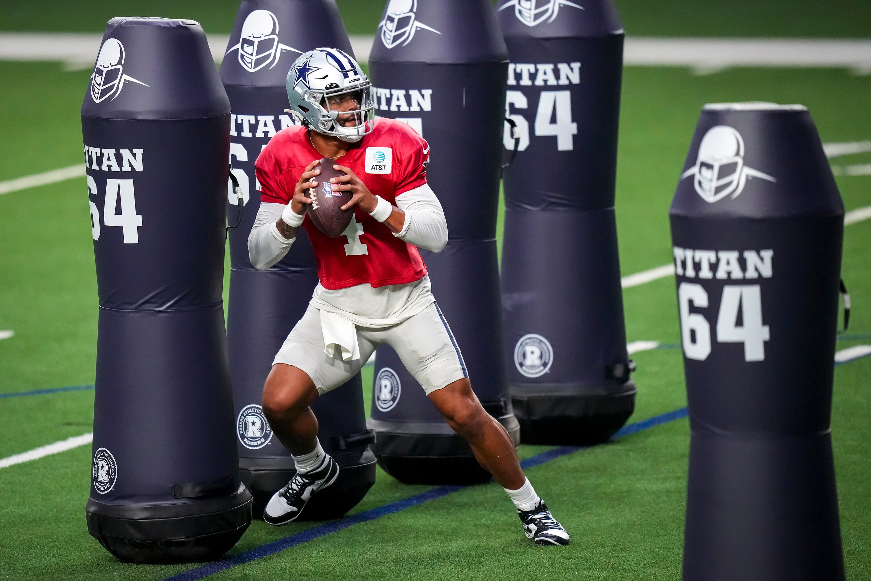 Dallas Cowboys quarterback Dak Prescott runs a drill during a training camp practice at The...