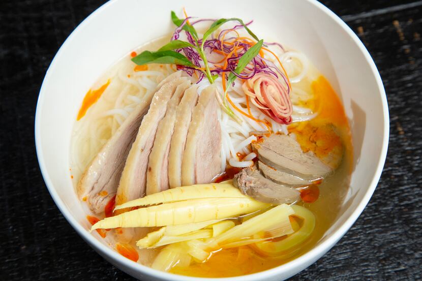 Bun Mang Vit is a duck and bamboo soup served with cabbage salad and ginger fish sauce...