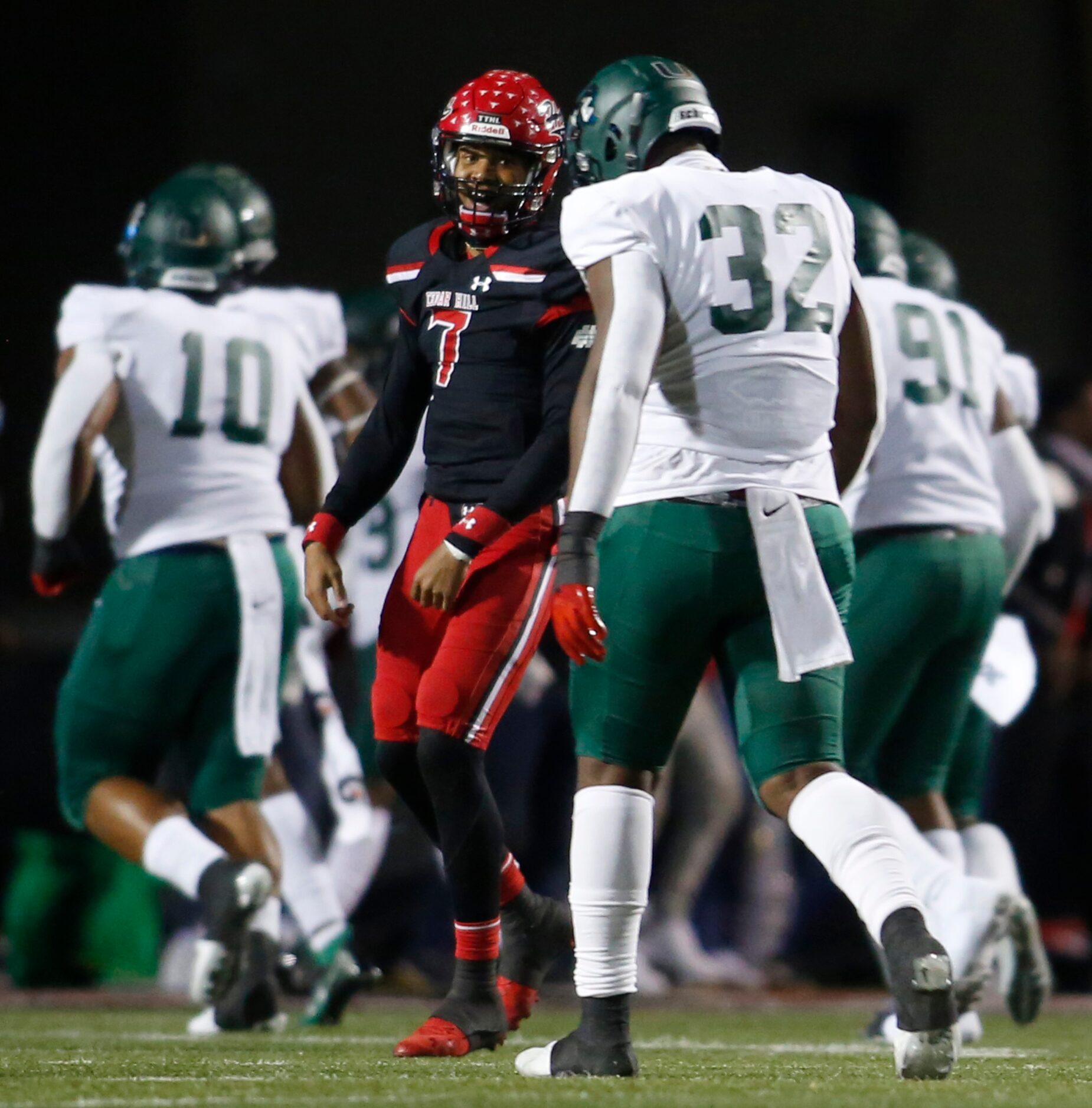 Cedar Hill quarterback Kaidon Salter (7) was all smiles contrasting the reaction of DeSoto...