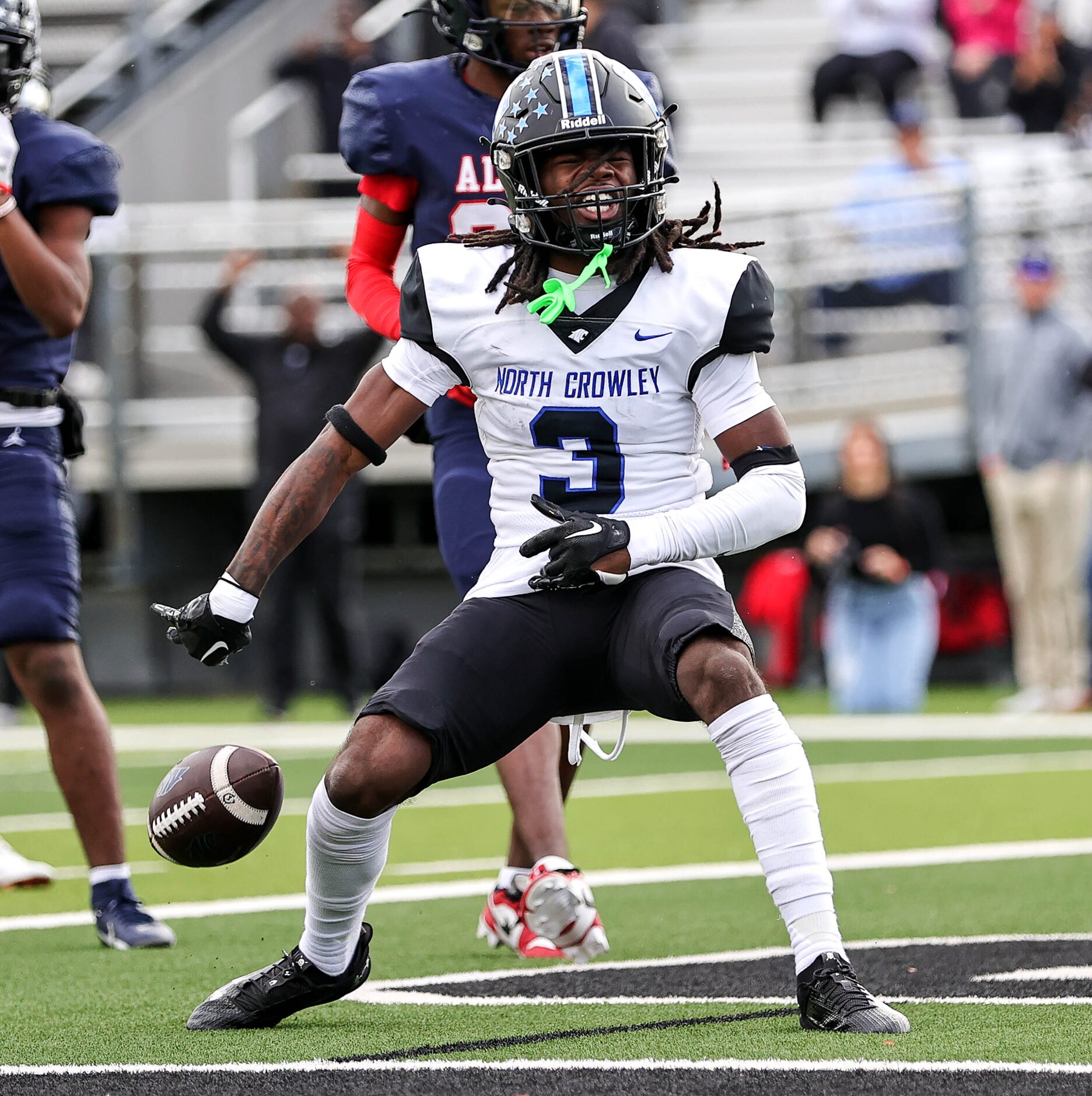 North Crowley wide receiver Dekoryian West-Davis celebrates his touchdown reception against...