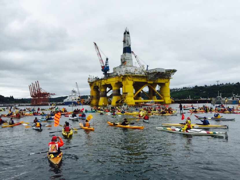 Activists in kayaks, who oppose Royal Dutch Shell's plans to drill for oil in the Arctic...