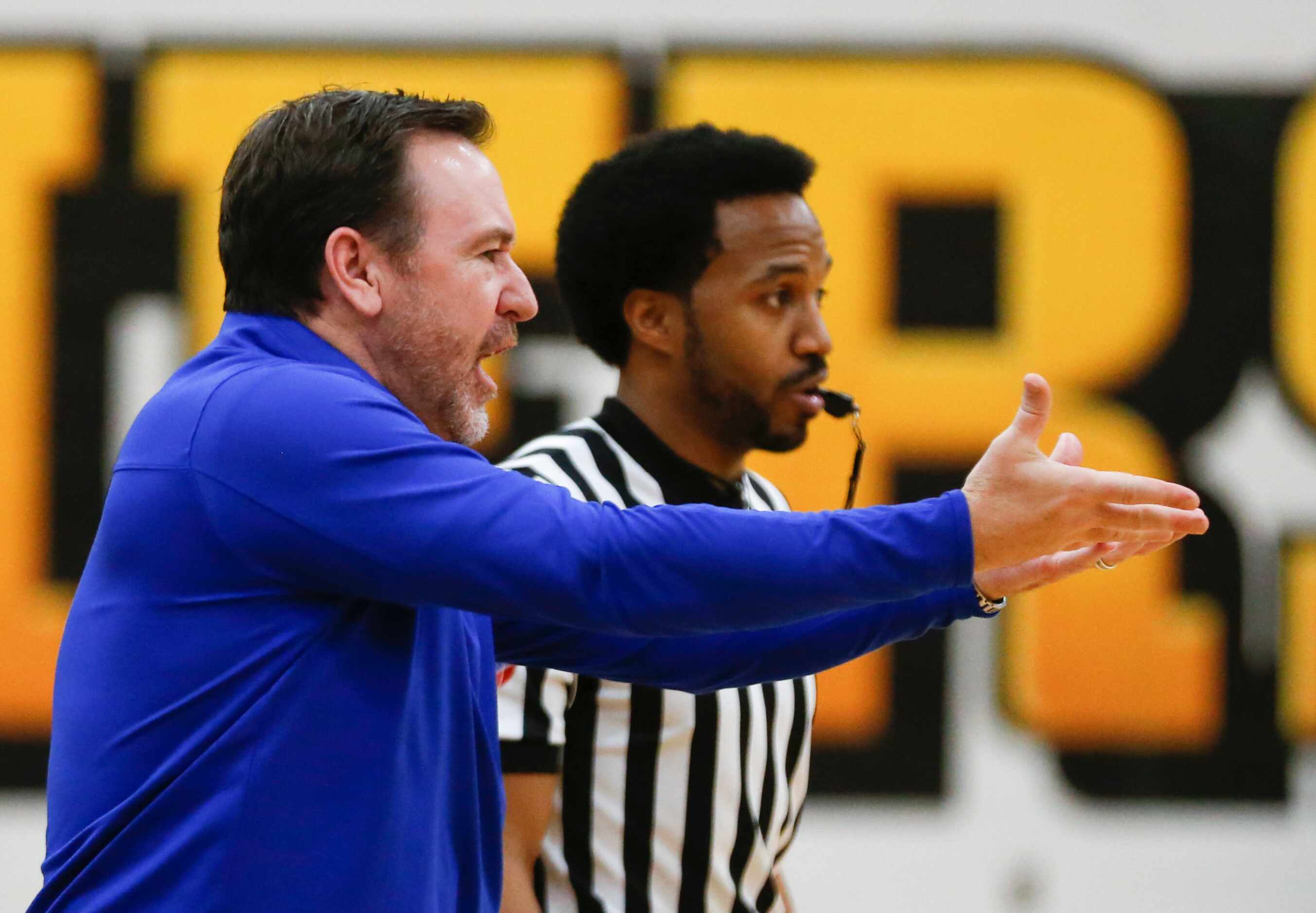 Byron Nelson High School head coach Scott Curran reacts to a call by a referee during the...