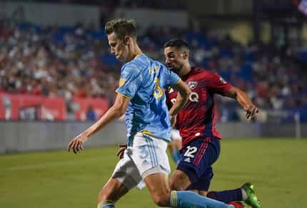 FC Dallas midfielder Sebastian Lletget (12) attempts to steal the ball from Philadelphia...