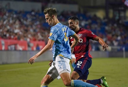 FC Dallas midfielder Sebastian Lletget (12) attempts to steal the ball from Philadelphia...