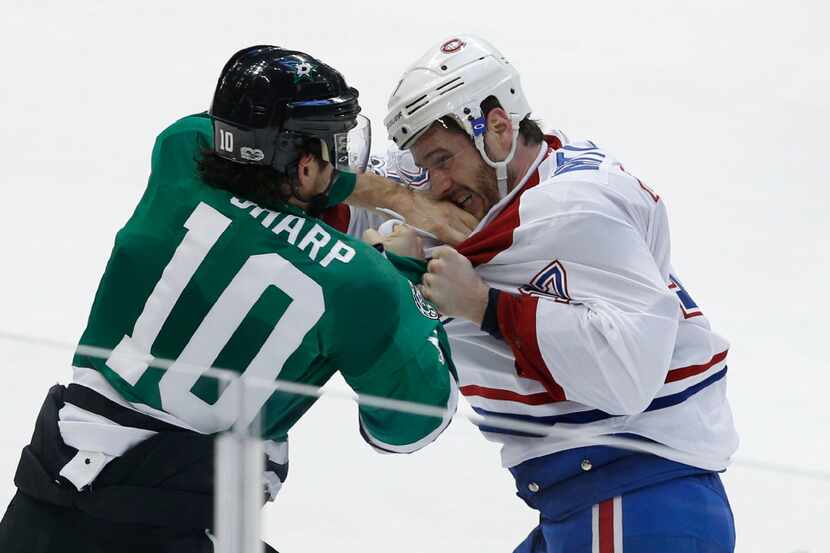 Dallas Stars left wing Patrick Sharp (10) and Montreal Montreal Canadiens center Torrey...