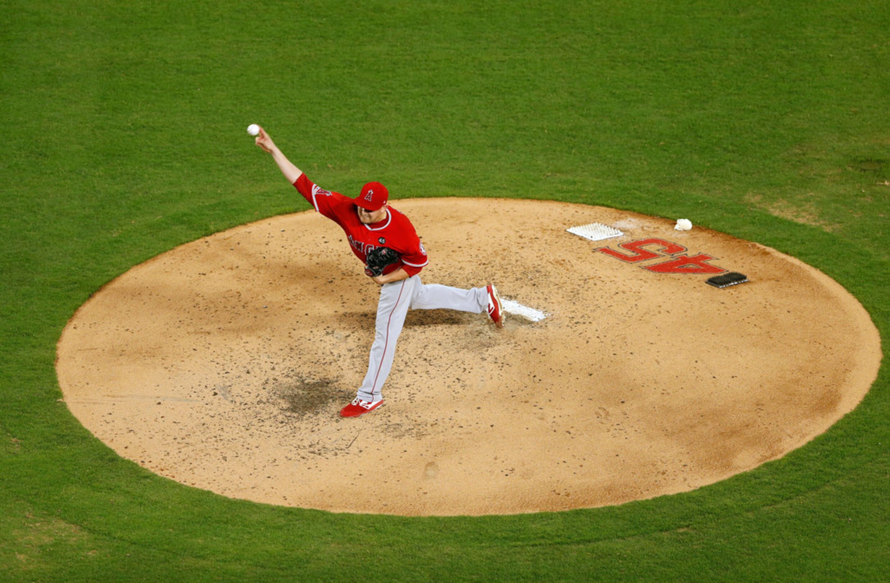 Los Angeles Angels pitcher Trevor Cahill (53) pitches against the Texas Rangers during the...