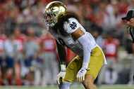 Notre Dame linebacker Marist Liufau lines up during the third quarter of an NCAA college...
