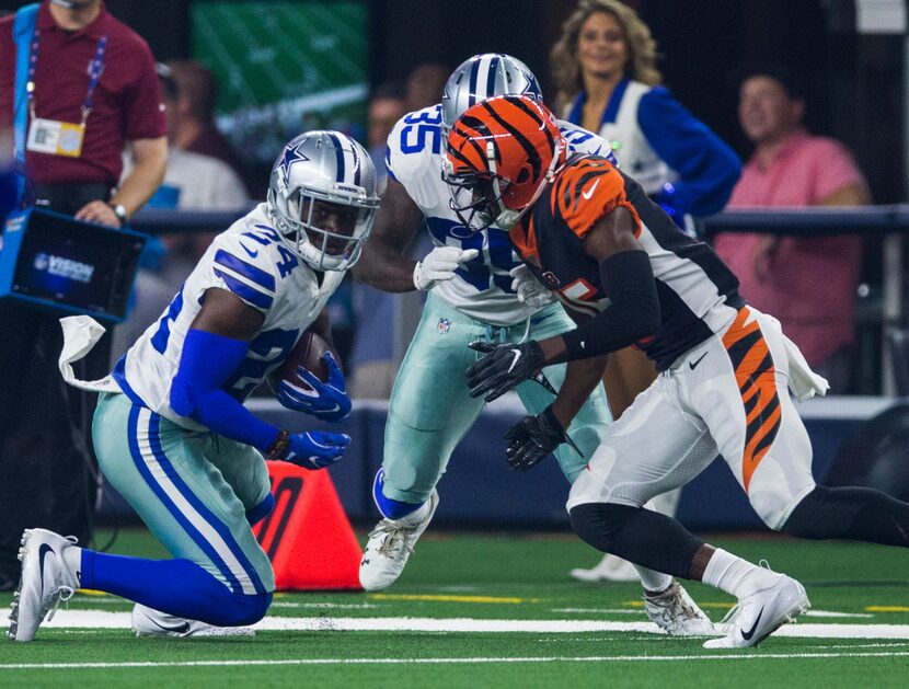 Dallas Cowboys cornerback Chidobe Awuzie (24) recovers after an interception during the...