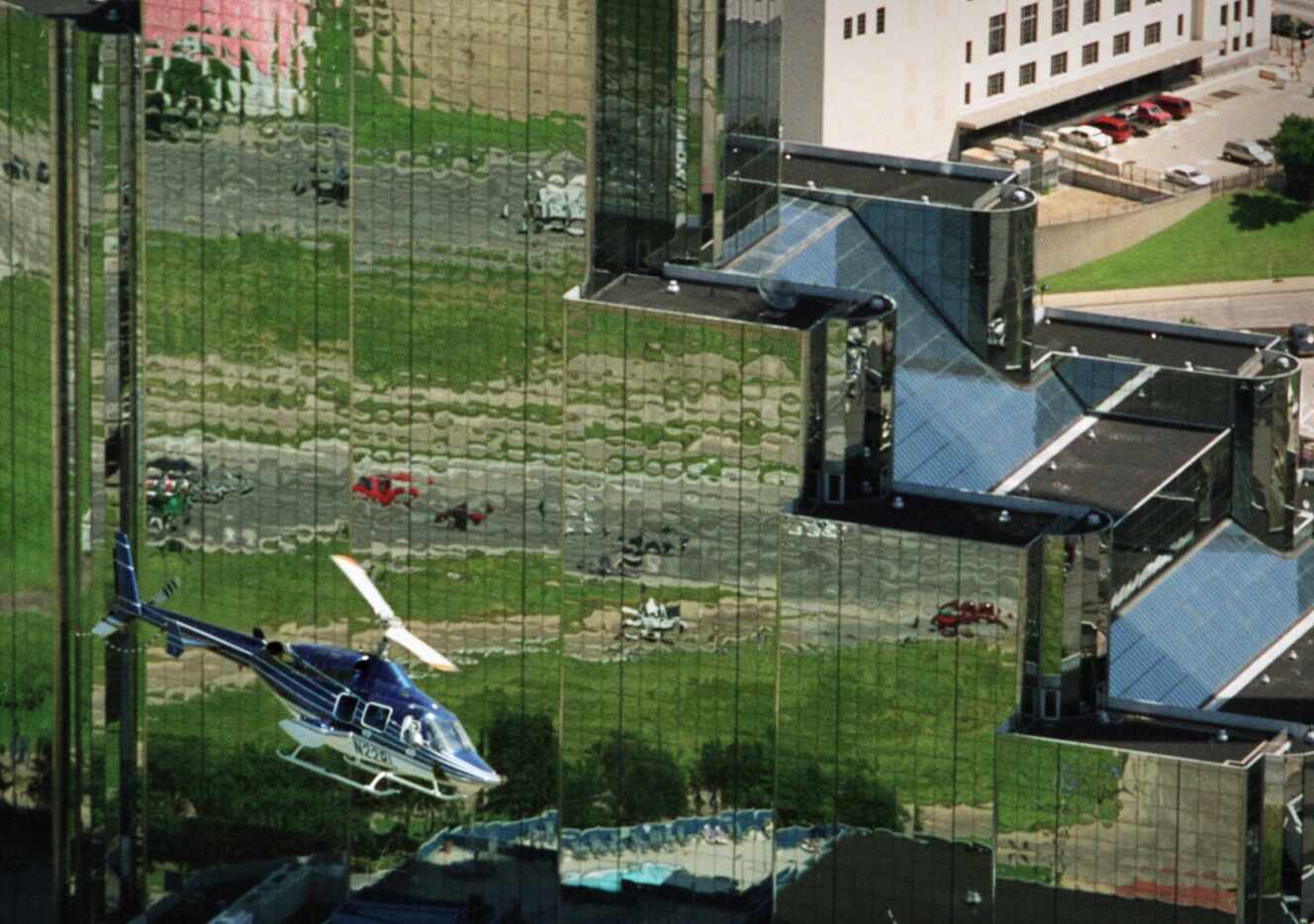 Boeing officials took a helicopter tour of Dallas in 2001, passing by the Hyatt Regency...