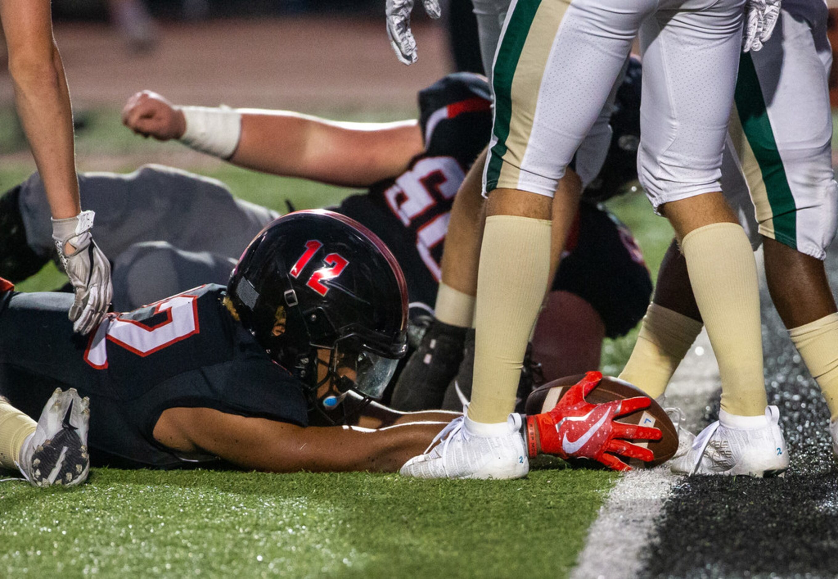 Lovejoy quarterback Noah Naldoo (12) attempts to score a touchdown from the one-yard line...