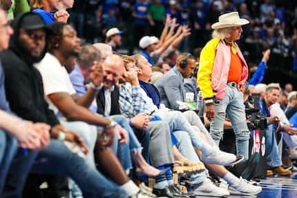 NBA superfan Jimmy Goldstein watches from courtside during the second half in Game 4 of an...