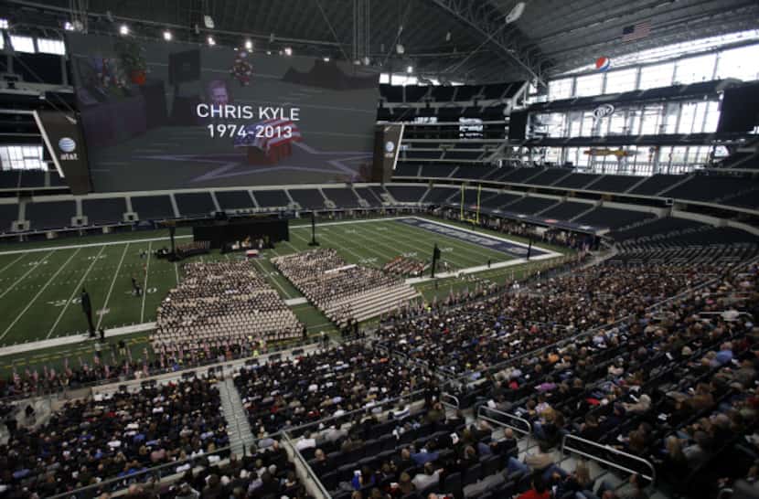 Chris Kyle is honored during a memorial service at Cowboys Stadium in Arlington on February...