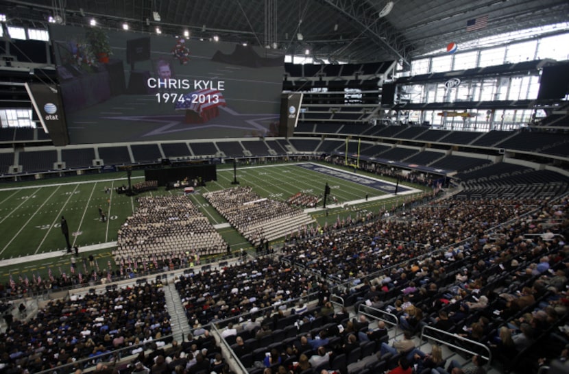 Chris Kyle is honored during a memorial service at Cowboys Stadium in Arlington on February...