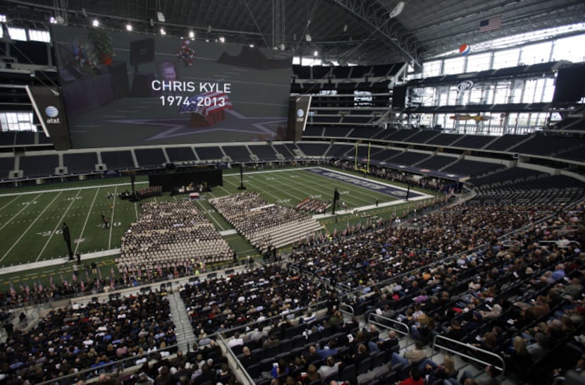 Chris Kyle is honored during a memorial service at Cowboys Stadium in Arlington on February...