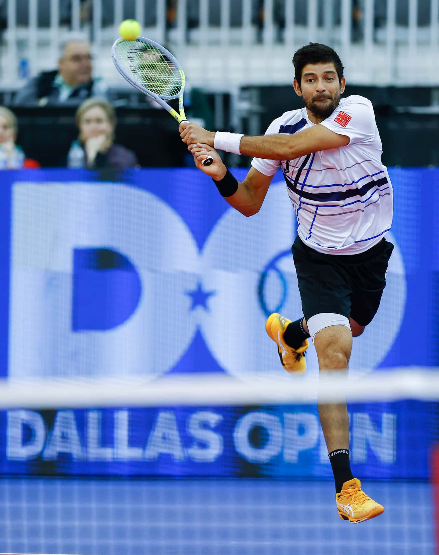 Marcelo Arevalo returns the ball during the doubles final of the ATP Dallas Open against...
