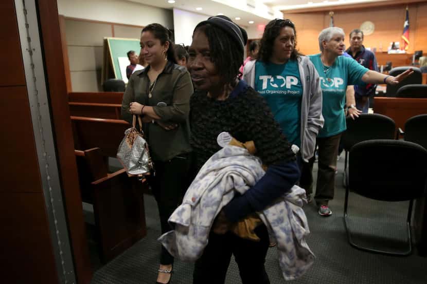 Pearlie Mae Brown, an HMK tenant, left a packed courtroom on Monday morning after a state...