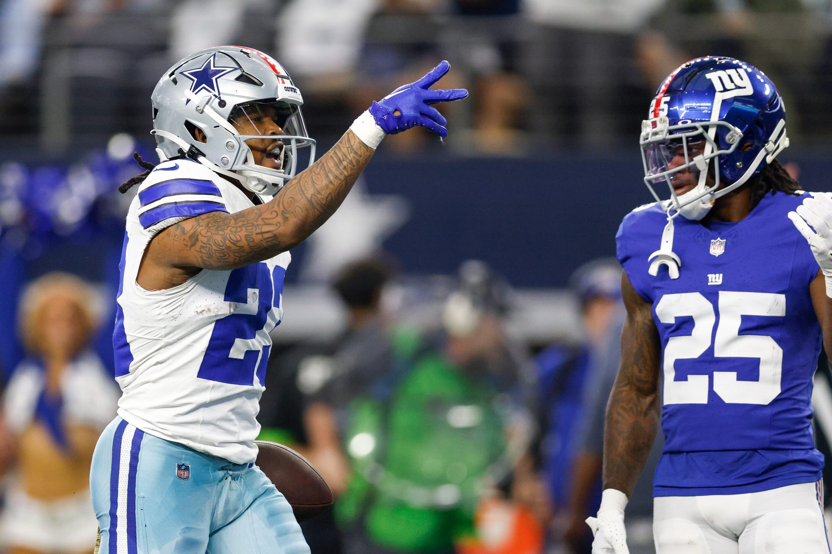 Dallas Cowboys running back Rico Dowdle (23) celebrates a first down run during the first...