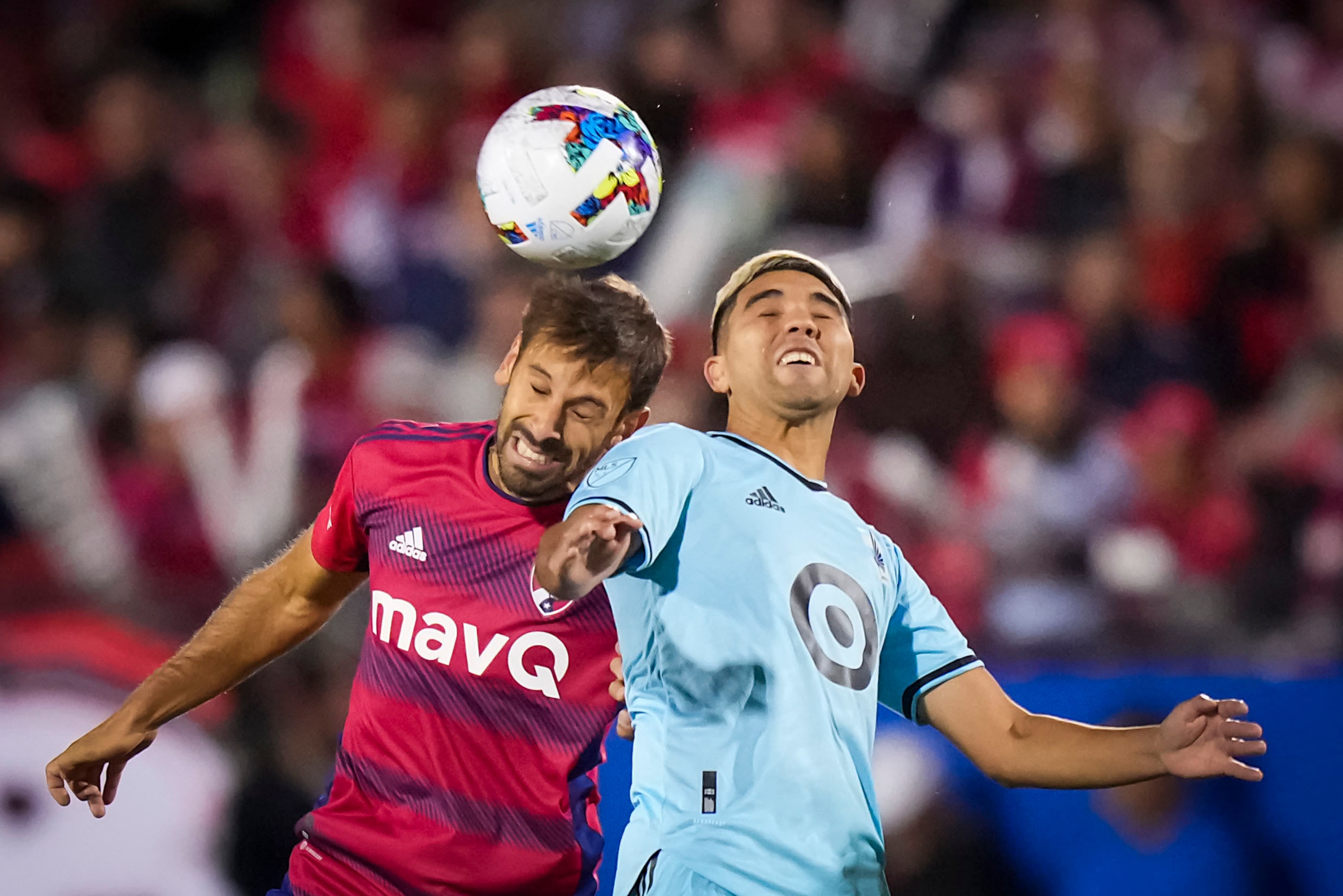 FC Dallas midfielder Facundo Quignon (5) challenges Minnesota United midfielder Emanuel...