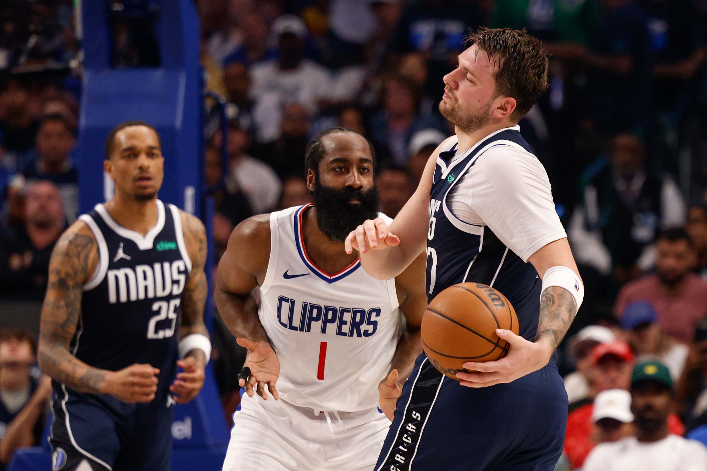 Dallas Mavericks guard Luka Doncic (77) reacts after being fouled by LA Clippers guard James...