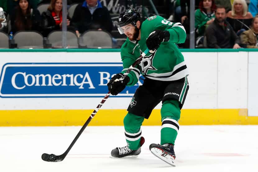 Dallas Stars center Tyler Seguin (91) takes a shot at the net in the first period of an NHL...
