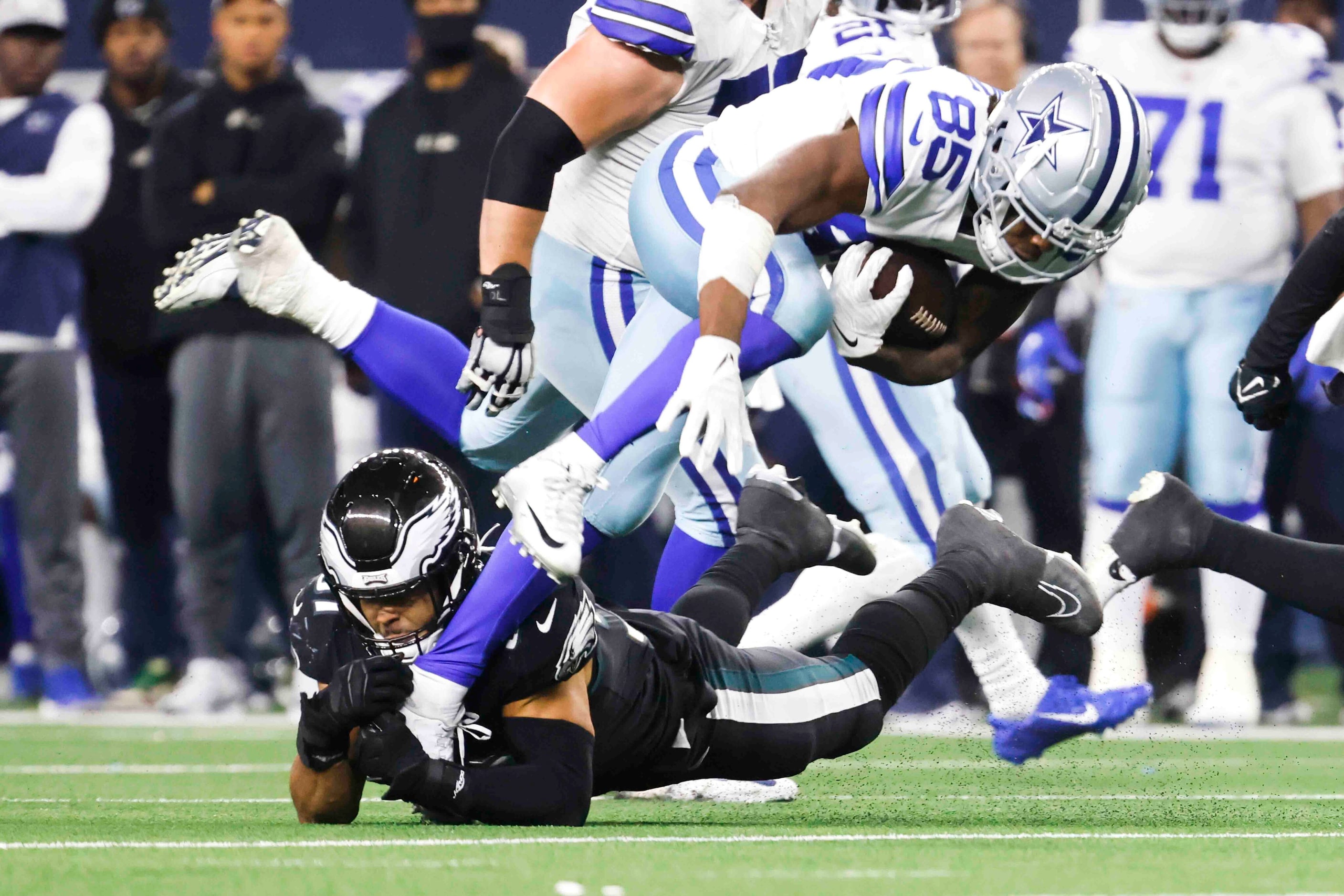 Dallas Cowboys wide receiver Noah Brown (85) gets tripped up by Philadelphia Eagles...